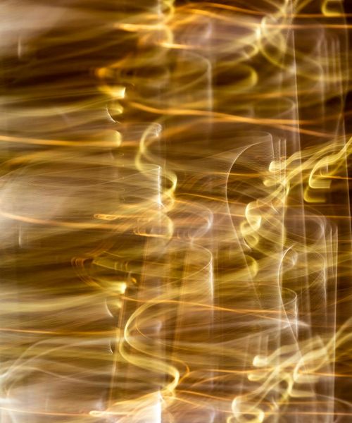 Abstract flow of golden energy lines